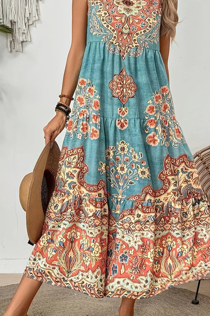 Full-length view of an elegant women's printed maxi dress, showcasing its flattering fit and long, flowy design.