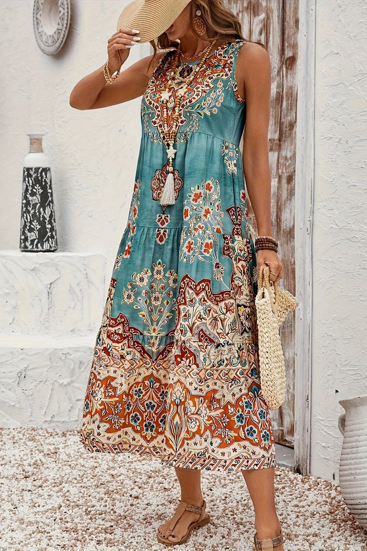 Close-up of elegant print on a women's flowy maxi dress, showcasing the intricate pattern and fabric.