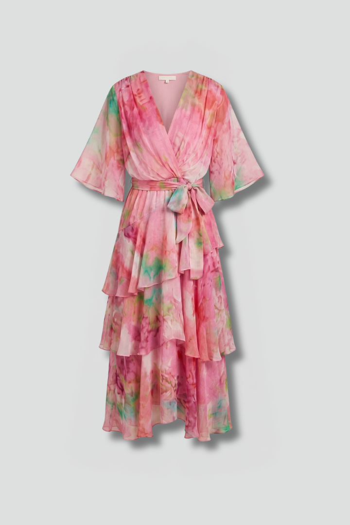 Elegant women's printed maxi dress with a flowing skirt, perfect for spring and summer events.