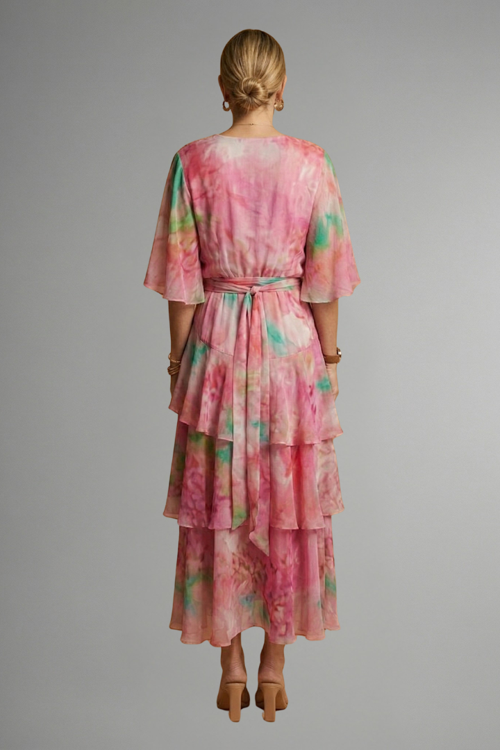Chic printed maxi dress for women, an elegant statement piece for parties or sophisticated spring outings.