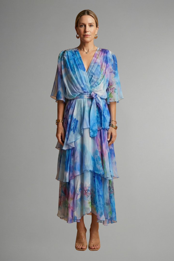 Women's elegant long sleeve printed maxi dress, featuring a flattering fit and a flowing silhouette.