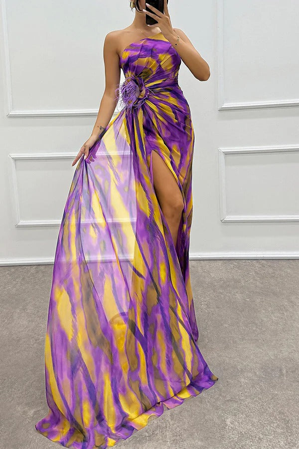 Flowy printed maxi dress for women, designed with elegant feather detail, making it an ideal wedding guest attire.