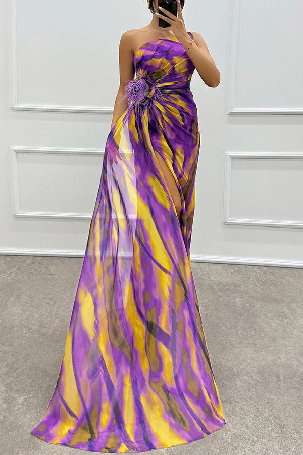 Stunning printed formal dress, a maxi gown featuring delicate feather accents, perfect for evening events.