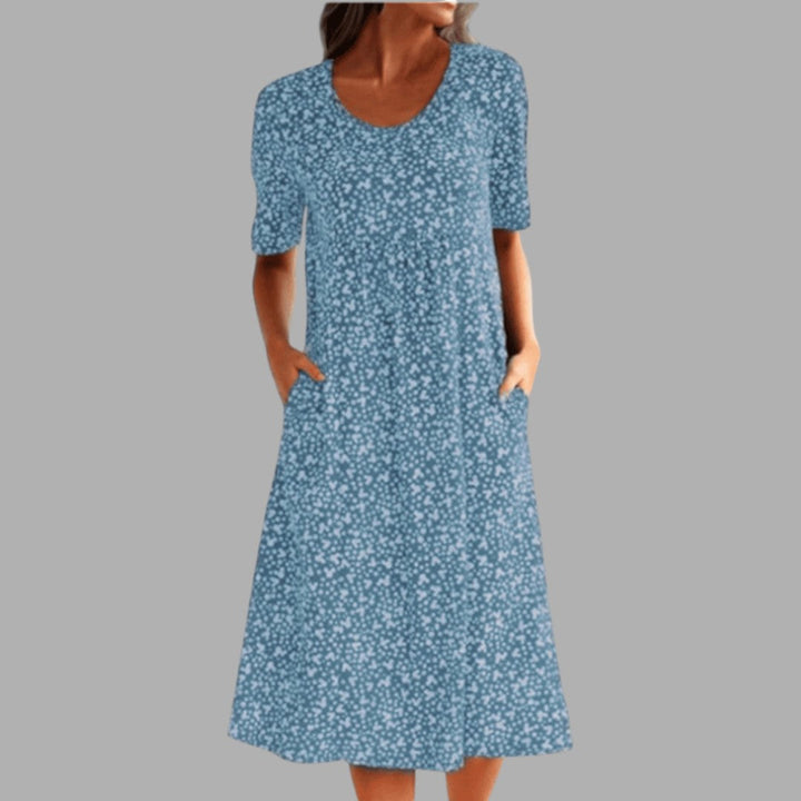 Beautiful women's summer midi dress, elegant printed design. Perfect for parties, flattering regular fit.