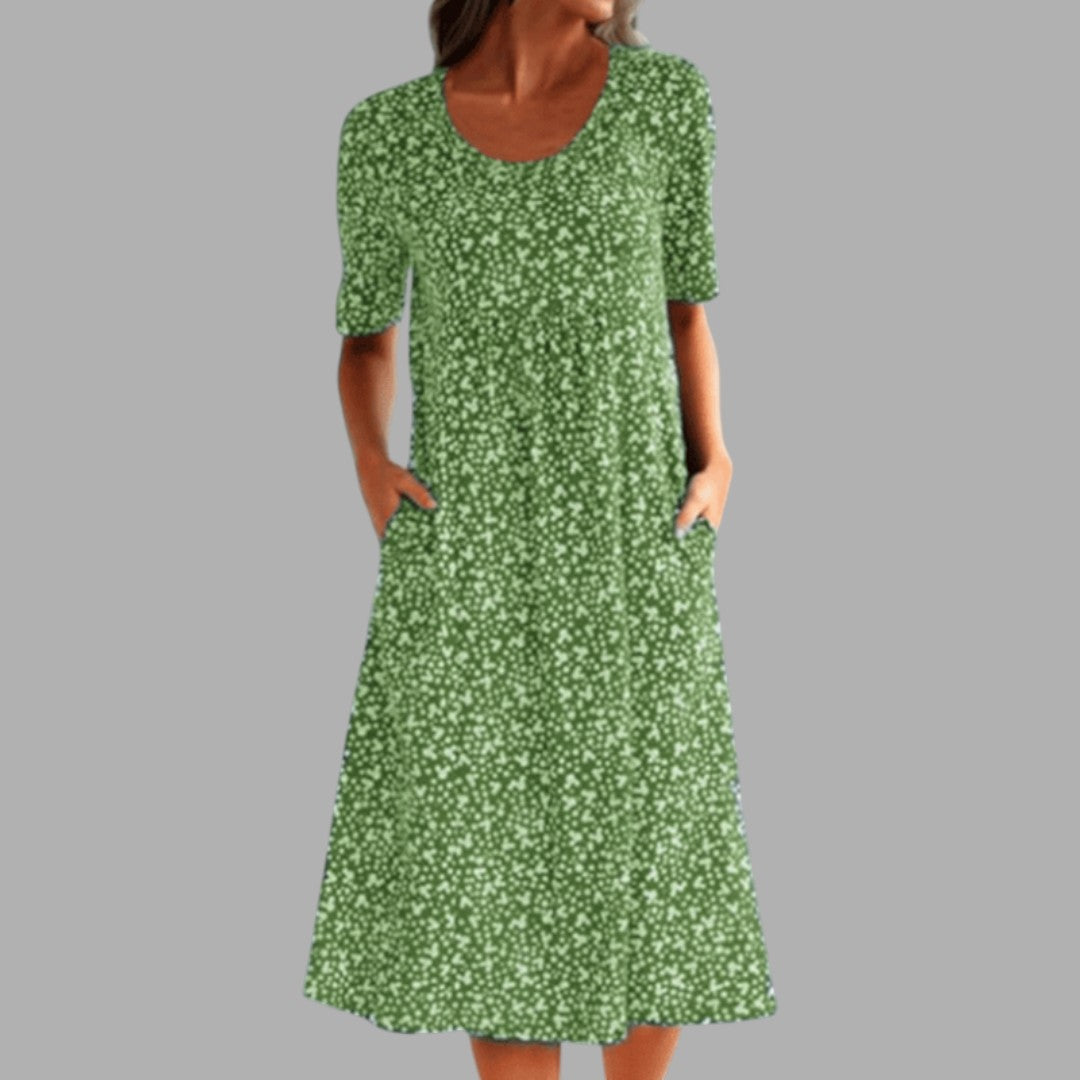 Flattering women's printed midi dress, elegant and chic. Ideal for spring fashion, regular fit.