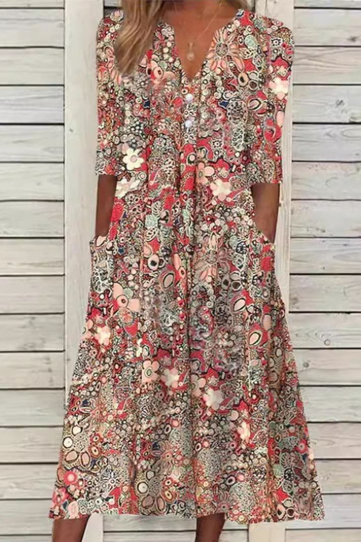 Elegant women's printed midi dress, perfect for all occasions. Flattering fit & chic summer style.