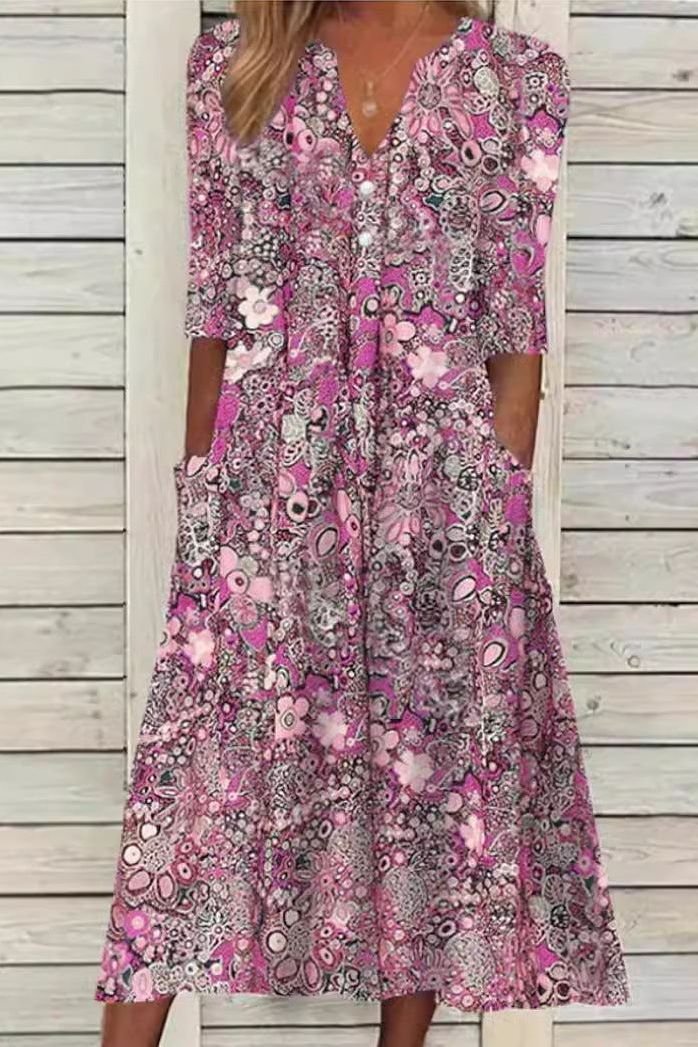 Stylish women's printed midi dress, an elegant fashion choice for summer. Flattering fit, versatile for any occasion.