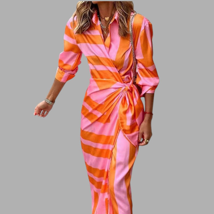 Elegant women's printed midi dress, perfect for semi-formal occasions. Stylish and flowy for comfortable wear.