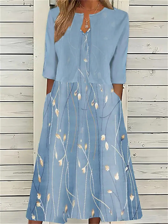 Elegant women's printed midi dress with a matching 3/4 sleeve cover-up. Versatile two-piece set for summer occasions.
