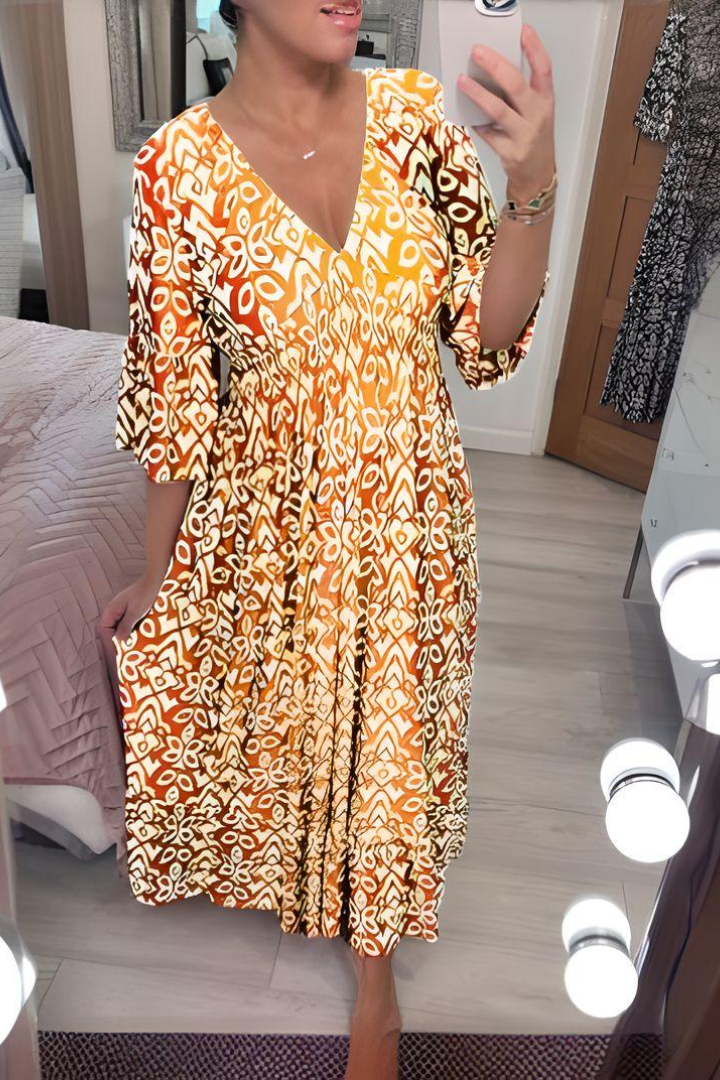 Elegant women's printed midi dress with belted waist, perfect for spring occasions. Flattering and versatile style.
