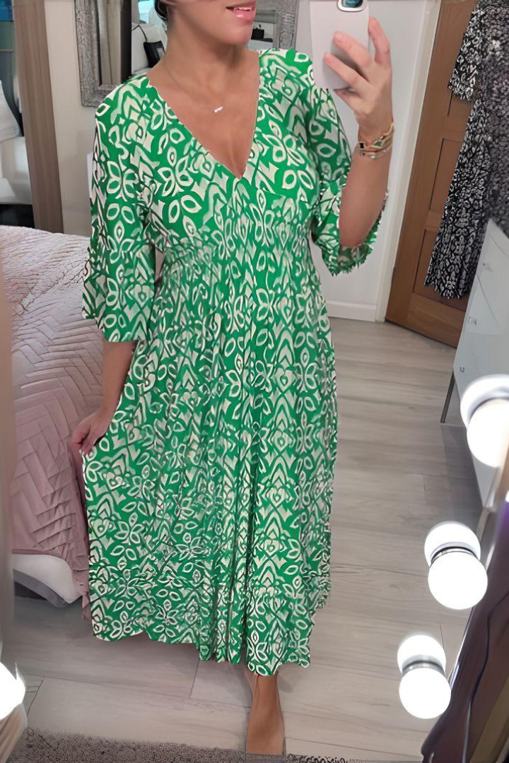Versatile women's elegant midi dress in a spring print, styled with a chic belted waist. Perfect for events.