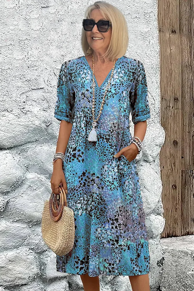 Versatile elegant printed midi dress for women, ideal for parties, spring events, or casual chic summer wear.