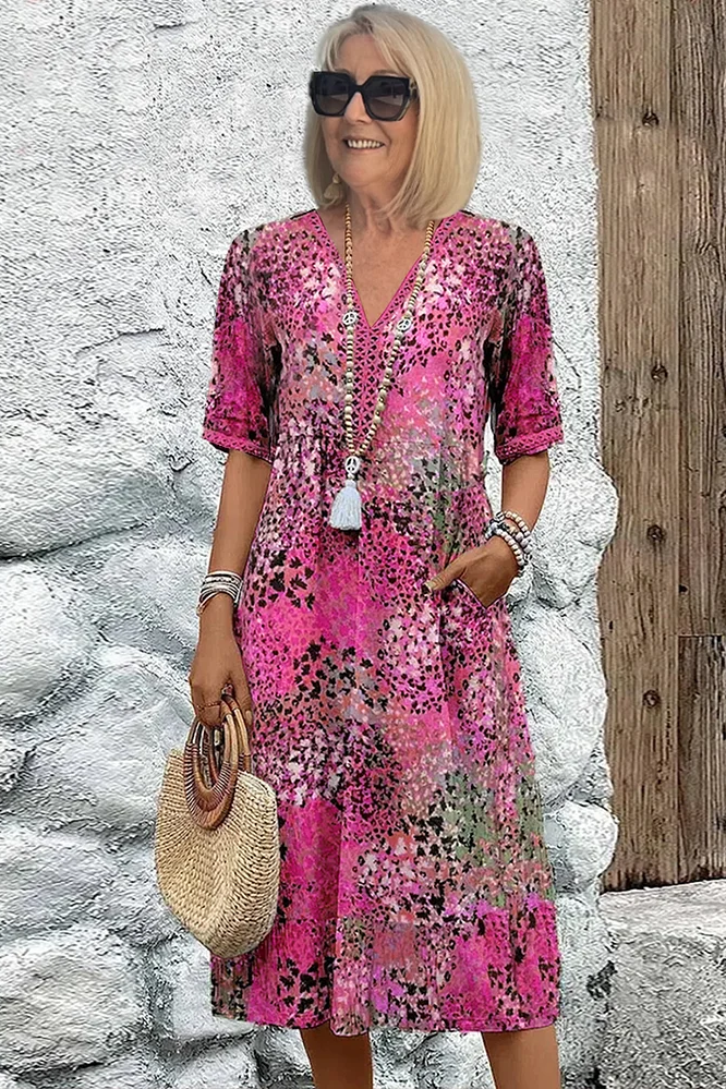 Stylish women's printed midi dress, a flattering spring fashion essential with graceful flow for elegant summer occasions.