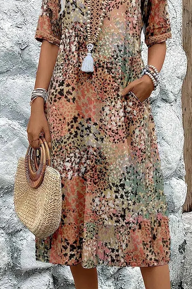 Elegant women's printed midi dress with graceful flow and comfortable fit, ideal for spring fashion & summer occasions.