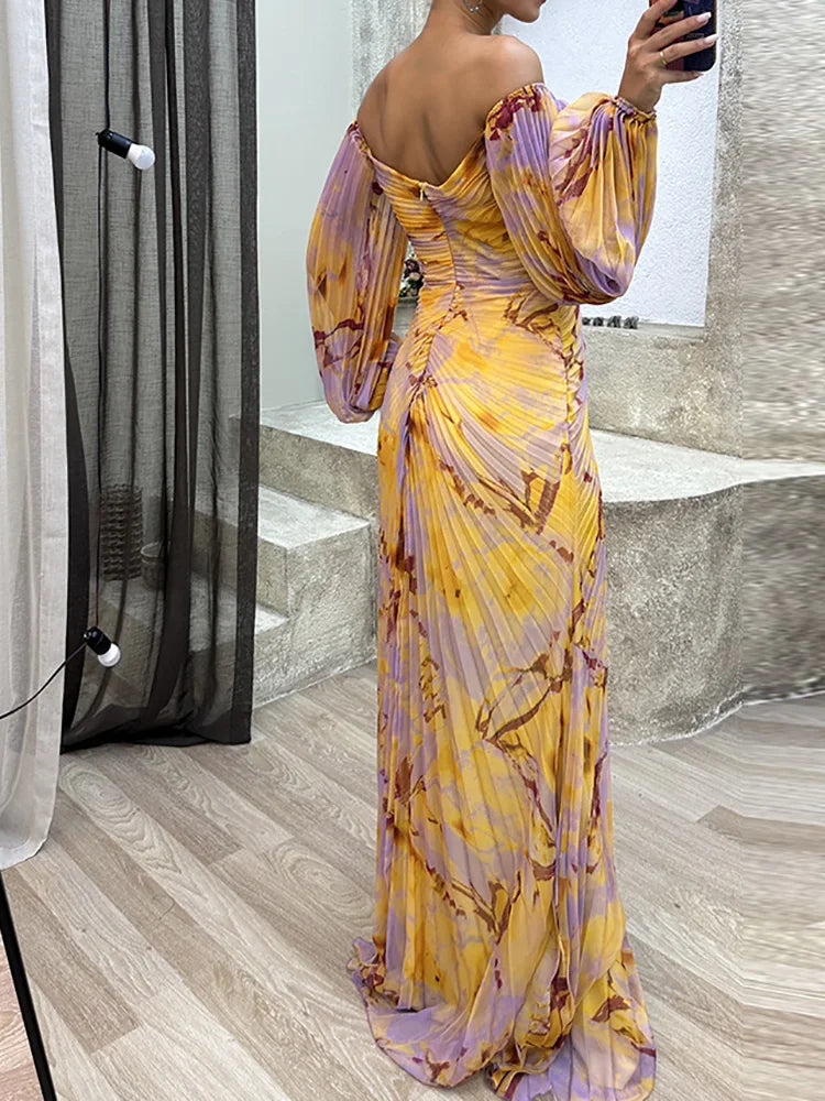 Women's elegant printed off-shoulder maxi dress, a stunning formal wedding guest gown for special occasions.