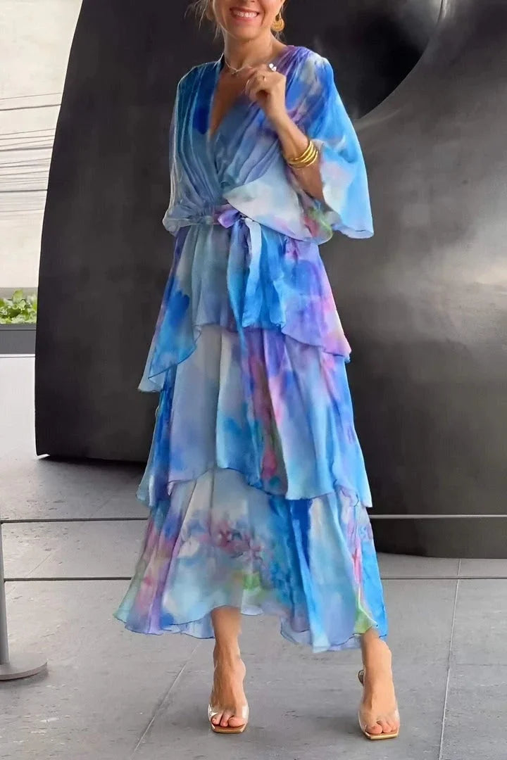 Elegant women's printed tiered wrap dress. Perfect for evening parties, summer events, or formal occasions.