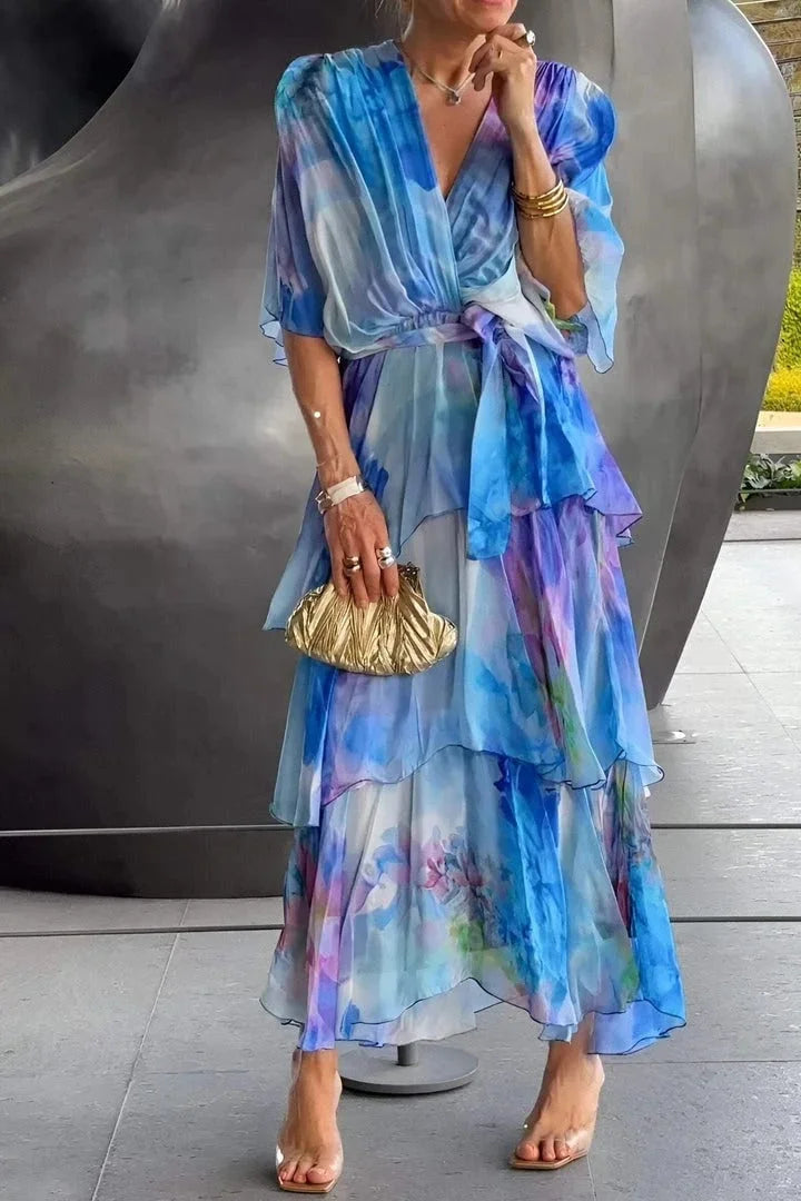Blue printed tiered wrap dress. A modest and elegant long dress for women, perfect for galas, parties, or formal wear.