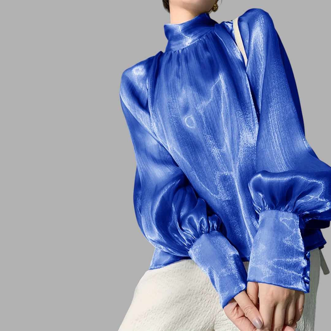 Feminine women's workwear blouse featuring elegant puff sleeves, ideal for professional office attire.