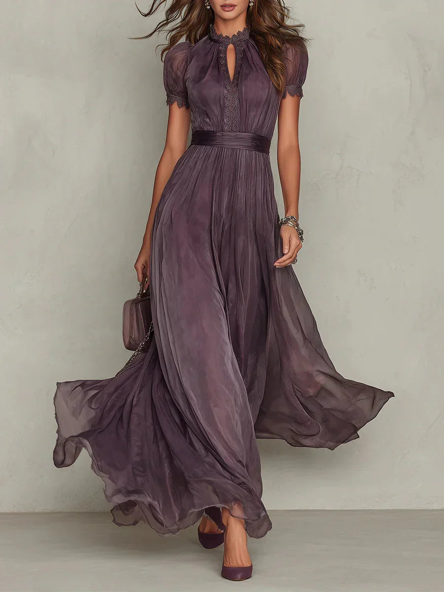 Women's formal floral pleated long sleeve maxi dress. Perfect elegant evening wear for special occasions.