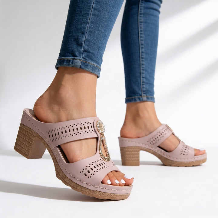 Chic women's platform block heel sandals with dazzling rhinestone T-strap. Cushioned for comfortable elegant wear.