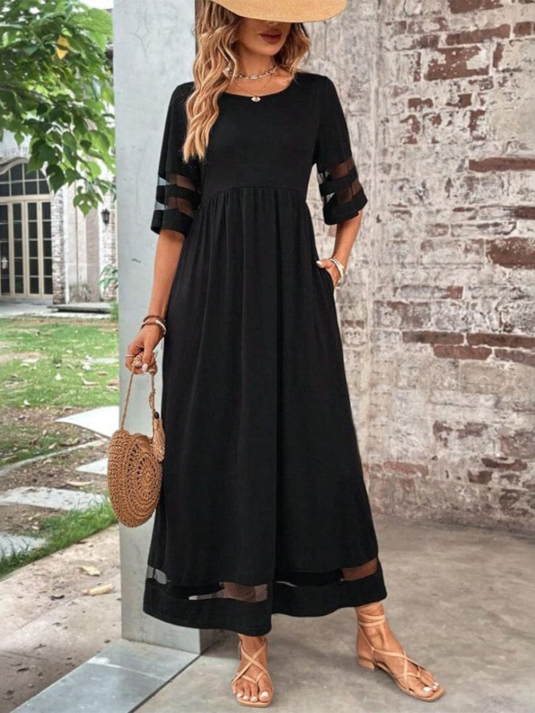 Elegant women's round neck maxi dress with stylish sheer short sleeves, perfect for evening or party wear.
