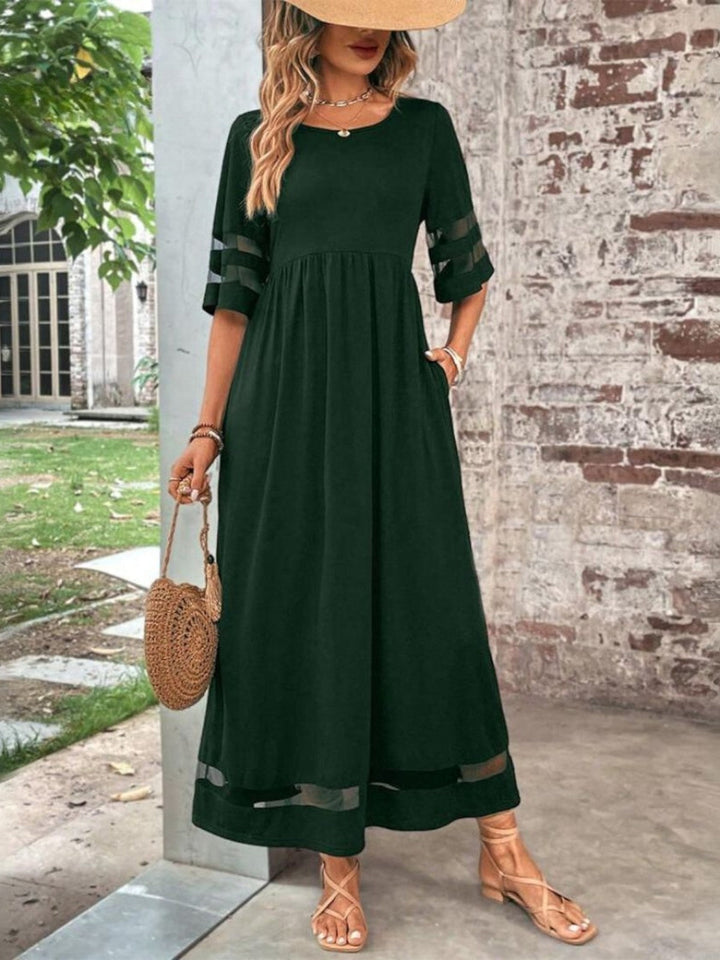 Chic women's round neck maxi dress featuring elegant sheer sleeves & a flattering gathered waist. Ideal for summer parties.
