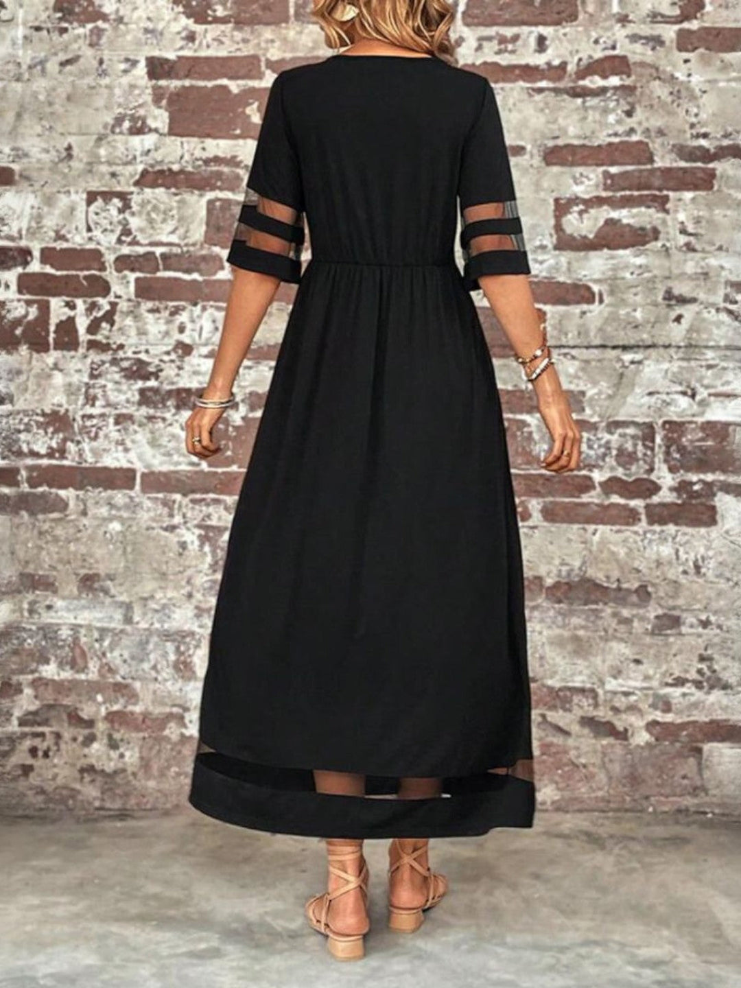 Beautiful women's evening maxi dress, round neck with sophisticated sheer sleeves & a flowy silhouette.