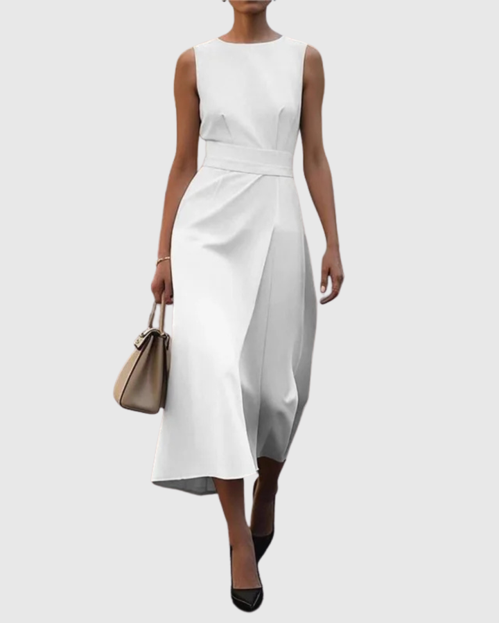 Versatile women's midi dress with a round neck. Elegant sleeveless design for stylish daywear or evening events.