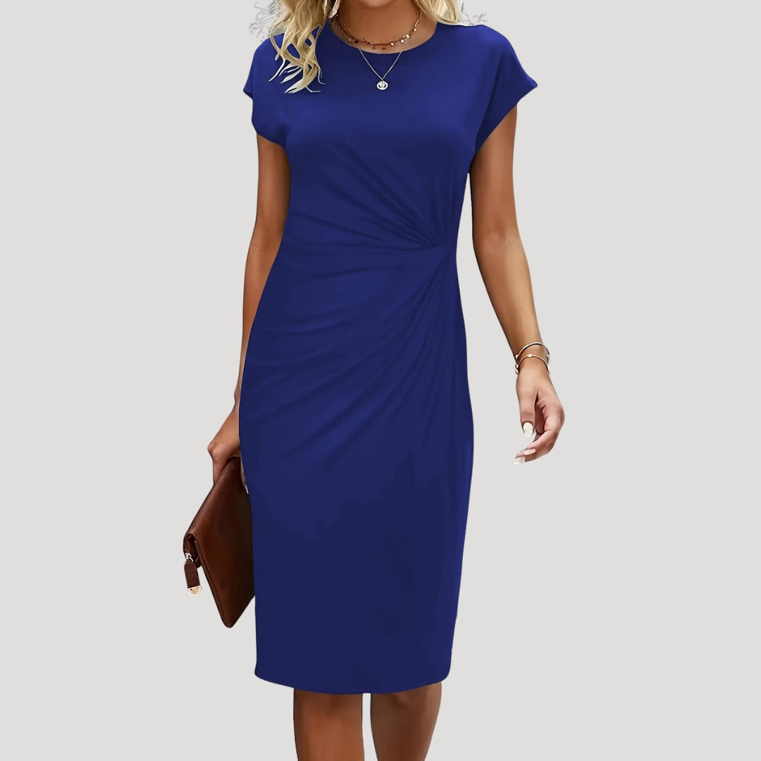 Professional women's cap sleeve midi dress, designed with flattering ruching for a sleek, elegant look.