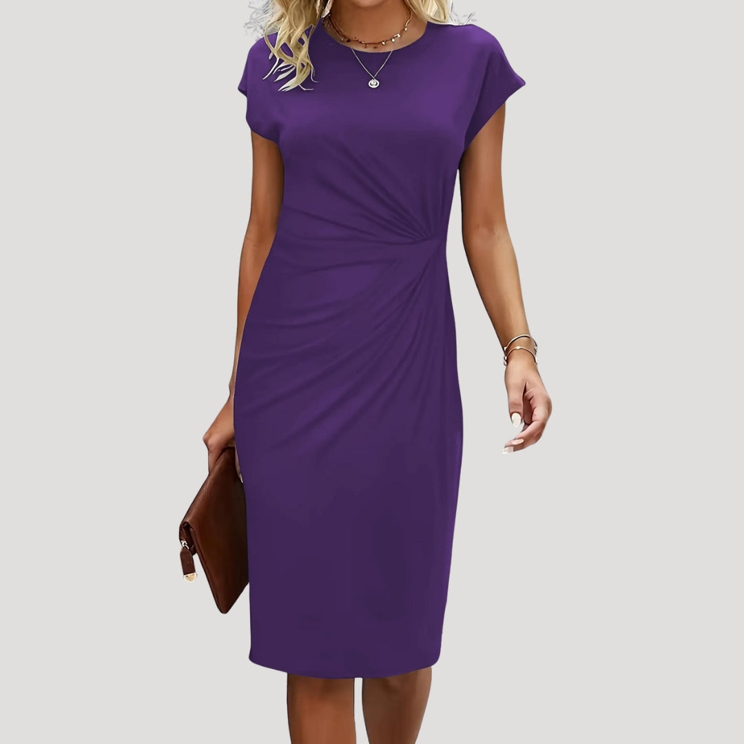 Modern women's ruched midi dress with cap sleeves, offering an elegant and professional silhouette for work.