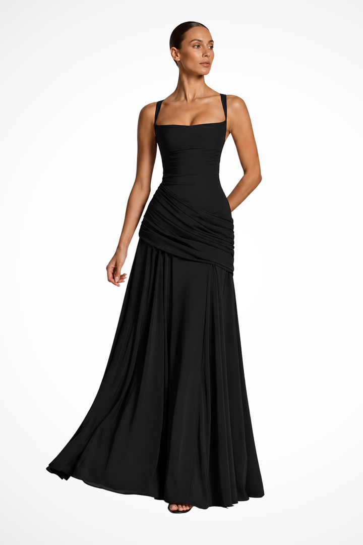 Elegant women's ruched spaghetti strap maxi dress, perfect for evening wear or special occasions. Flowy long formal gown.