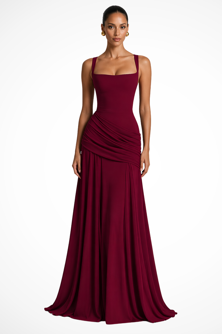 Sophisticated women's ruched spaghetti strap maxi dress. This long, elegant gown is perfect for formal evening wear.