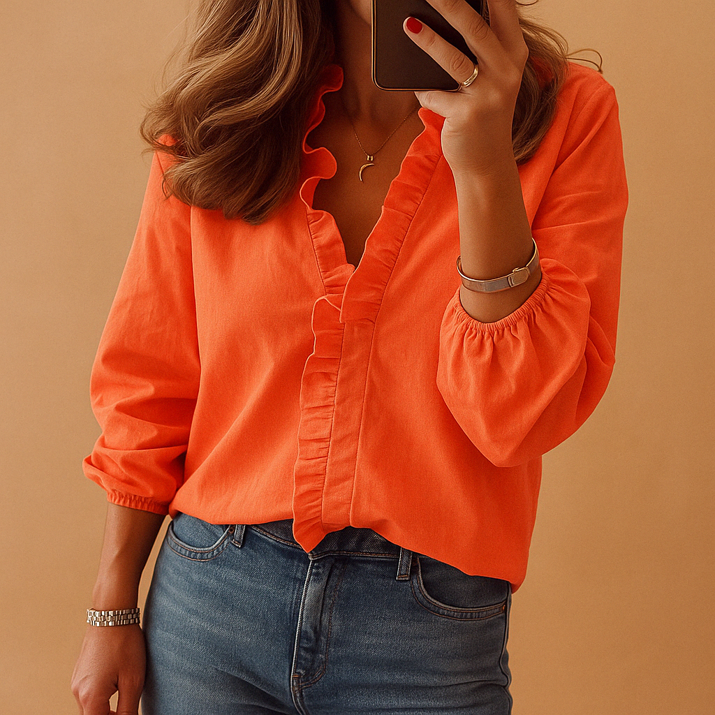 Elegant women's ruffle blouse for sophisticated office wear or chic casual style. Versatile fashion top.