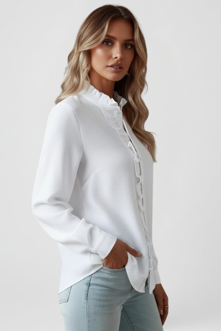 Classic women's button-front long sleeve top with ruffles, ideal for fall fashion and professional office wear.