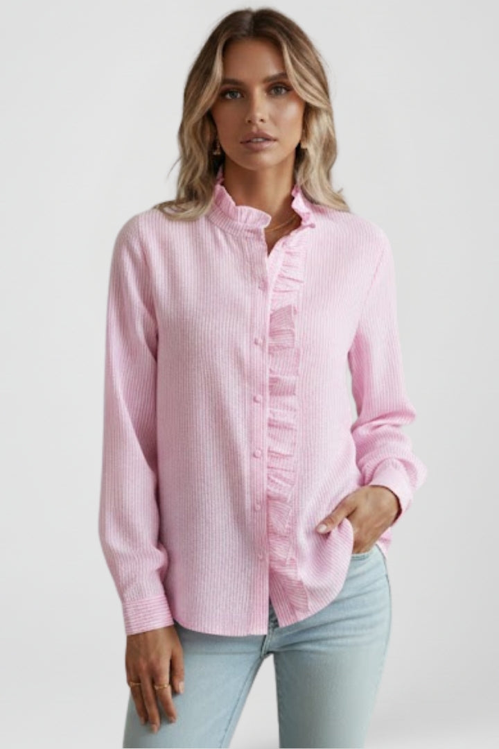 Comfortable women's button-front ruffle top with long sleeves, a classic elegant shirt for everyday or office fashion.