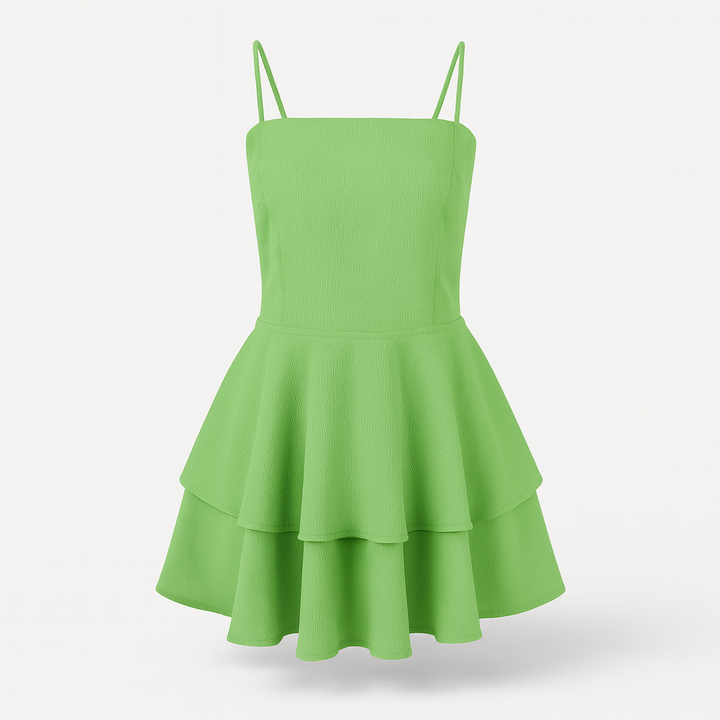 Elegant women's ruffle mini dress with delicate spaghetti straps, perfect for summer parties.