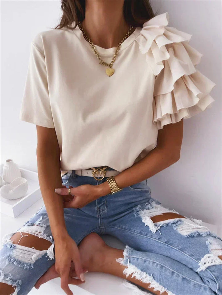Stylish women's ruffle sleeve top, an elegant blouse with a unique design, great for casual elegance or evening wear.