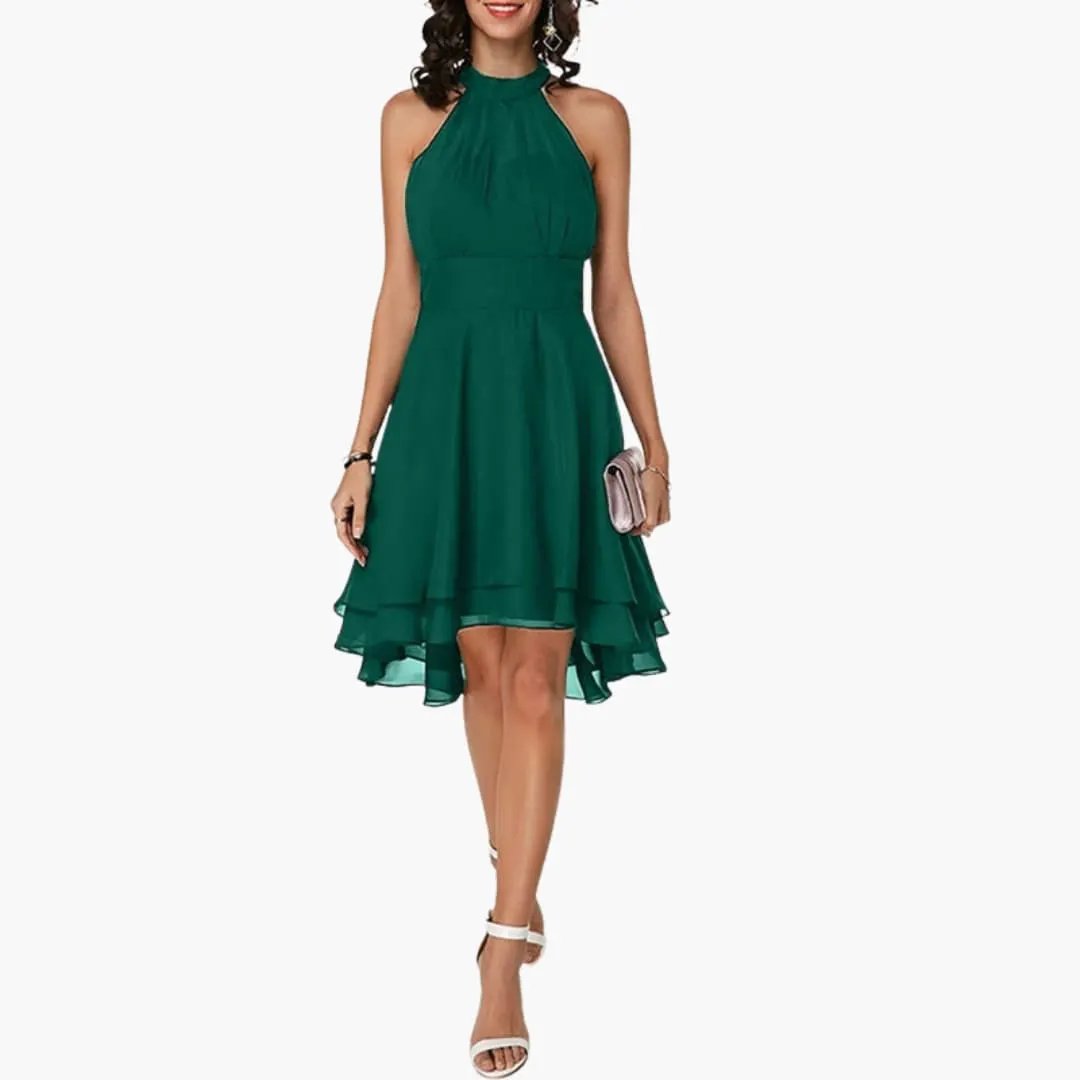 Feminine ruffle sleeveless dress for women, featuring a flattering round neck and elegant knee-length hemline.