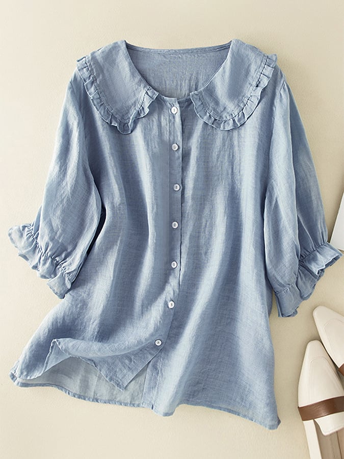 Elegant women's ruffled collar shirt with three-quarter sleeves. Versatile summer top, perfect for casual or office wear.