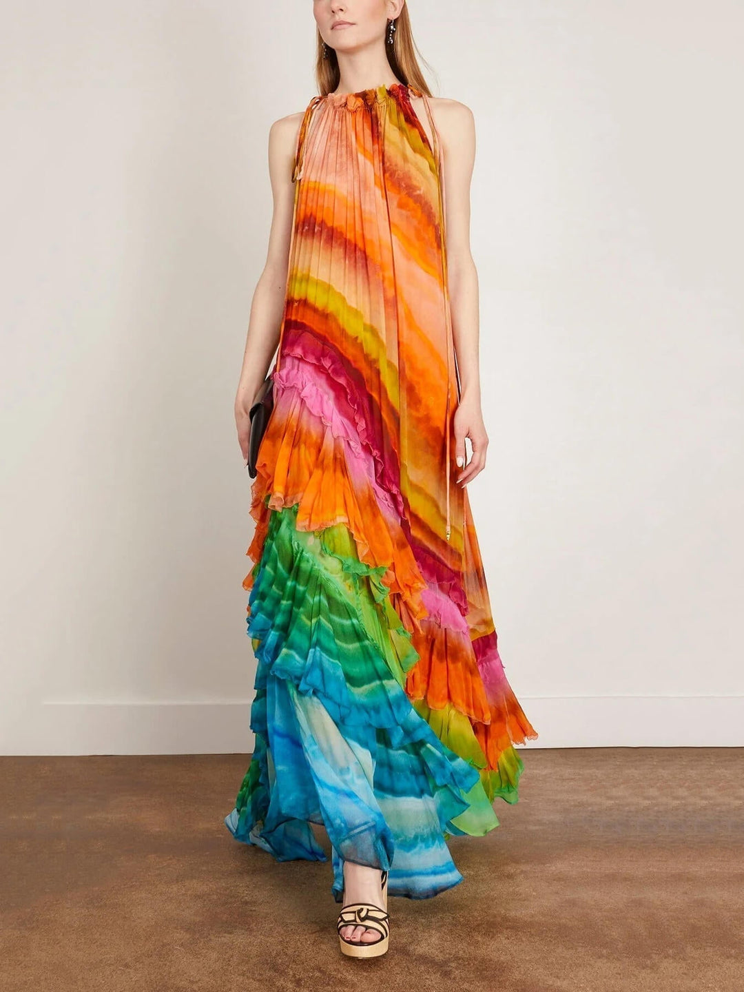 Chic women's tiered ruffled maxi dress with a halter neckline. Comfortable & flowing for elegant summer fashion.