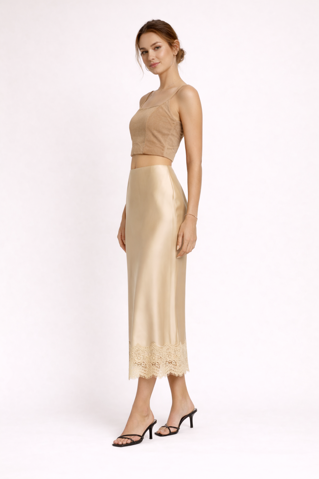 Chic women's long satin finish skirt, shimmering with a luxurious sheen & intricate lace detail on the hem.