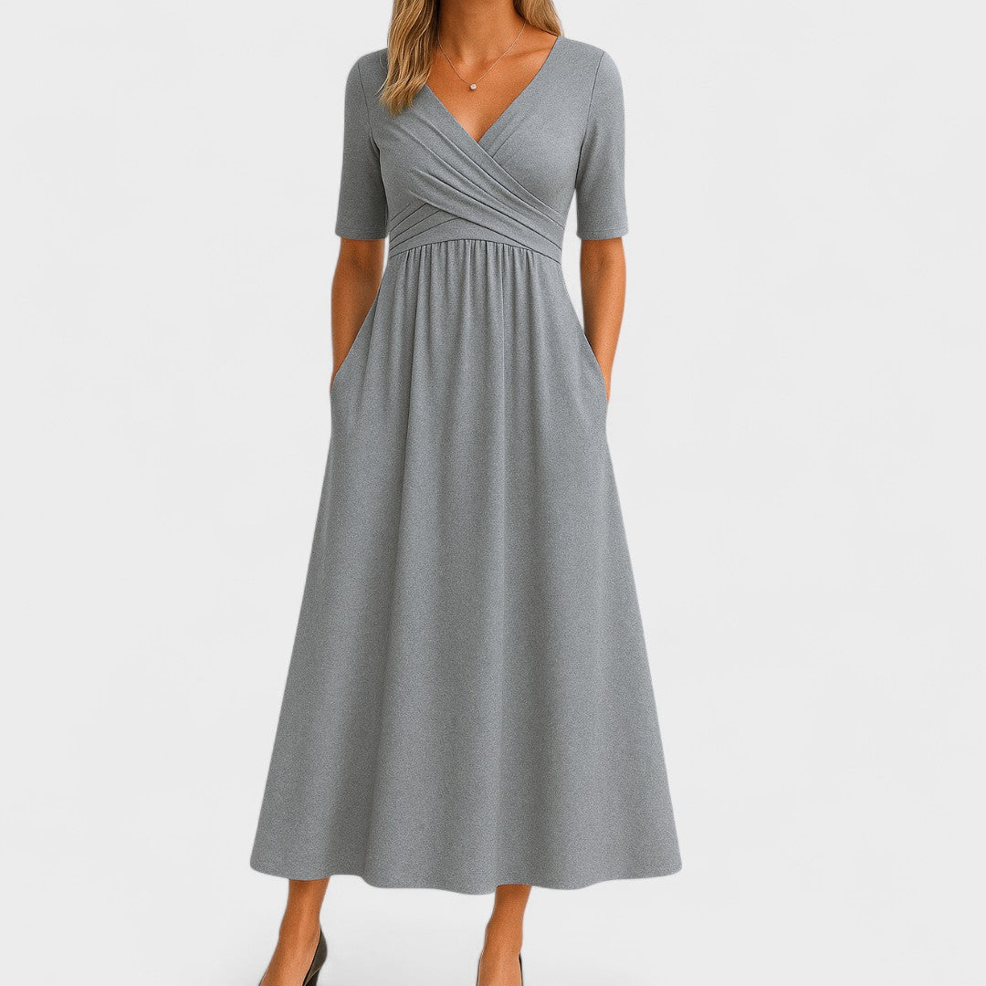Elegant women's semi-formal A-line wrap dress with V-neck and 3/4 sleeves, perfect for occasion wear.