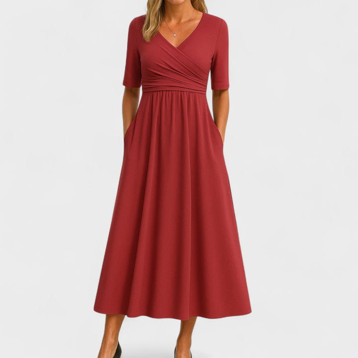 Stylish women's elegant semi-formal wrap dress, featuring a classic A-line midi design for sophistication.