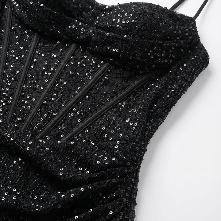 Strapless sequin formal gown featuring a sweetheart neck & alluring high slit. Women's elegant evening dress.