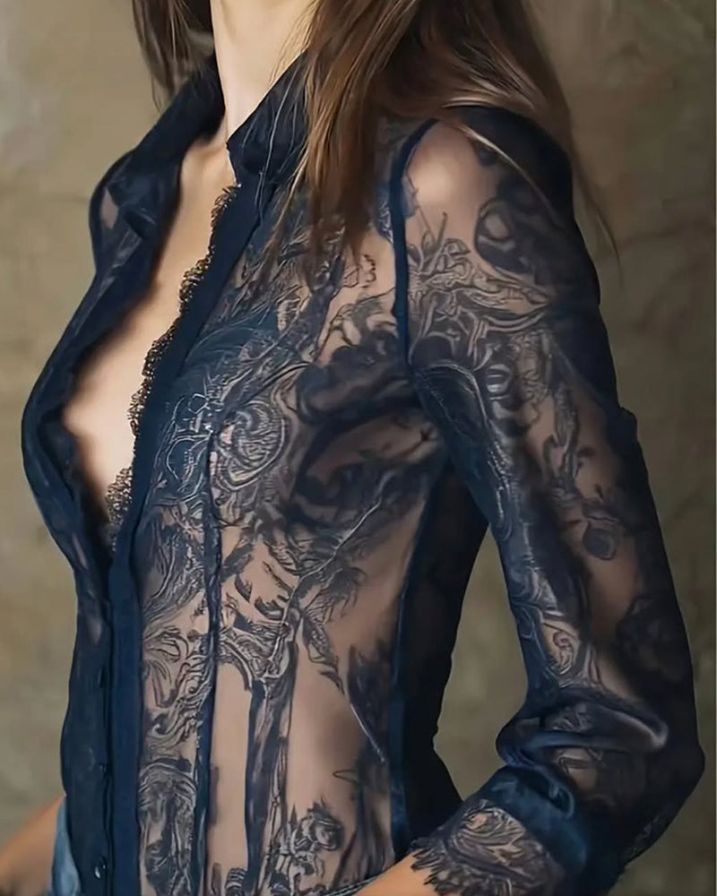 Chic sheer button-front blouse for women, featuring a delicate lace trim and long sleeves.