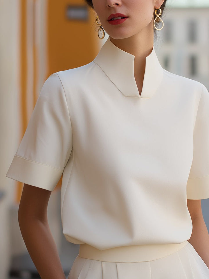 Stylish women's short sleeve mandarin collar blouse, ideal for spring/summer office wear or casual chic.
