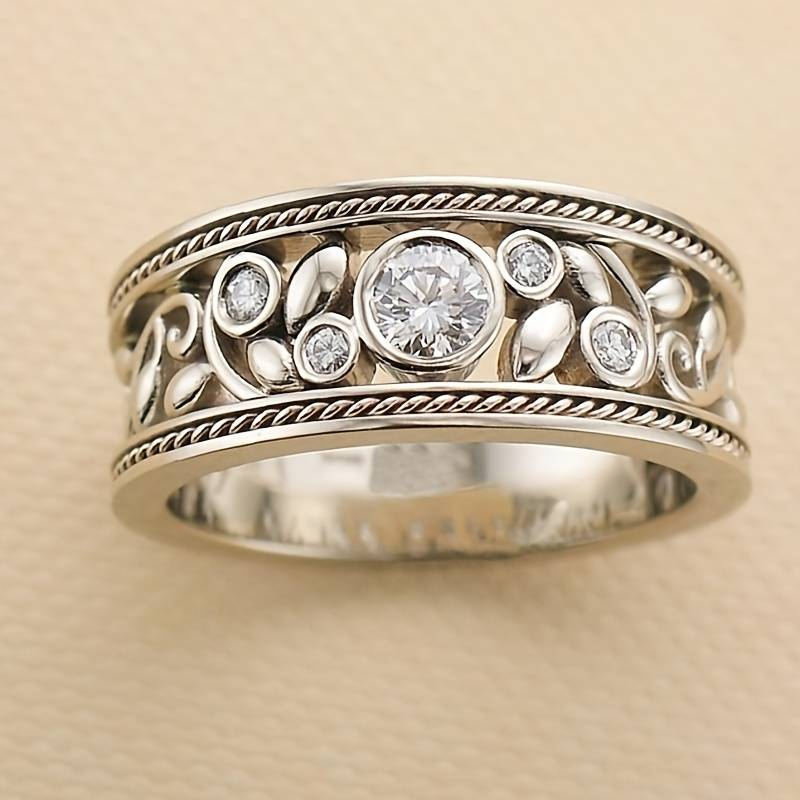 Elegant women's silver ring with sparkling zirconia stones, perfect for daily wear or special occasions. Versatile & stackable.