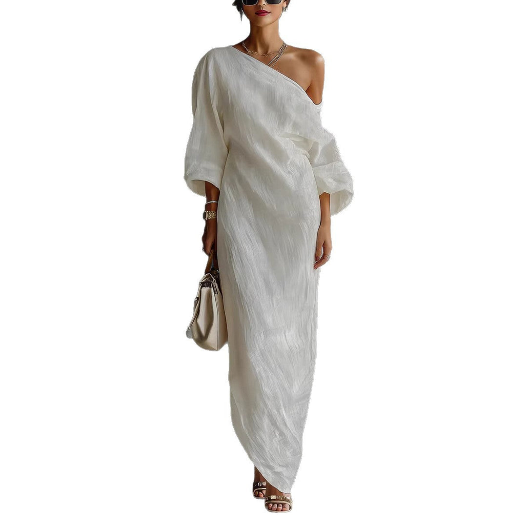 Comfortable flowy women's maxi dress. Elegant slanted neck and stylish lantern sleeves for everyday wear.