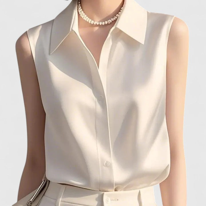 Versatile women's sleeveless blouse for elegant office wear or stylish layering. Chic summer top for women.