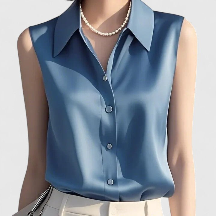 Chic women's sleeveless blouse with a sophisticated cut, ideal for office or elegant casual wear. Summer shirt.